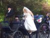Bride leaving church in 2HP Carriage - not Rover.JPG